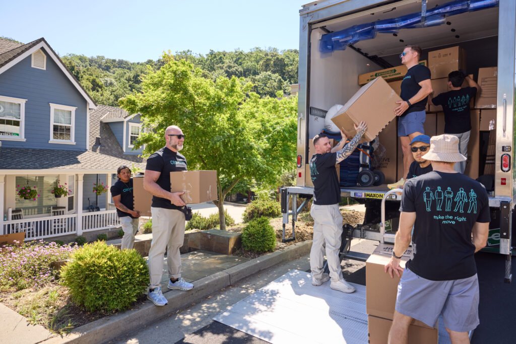 Movers loading boxes into a truck during a Bay Area move