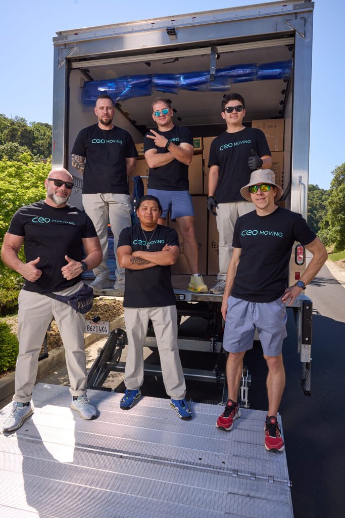 CEO Moving crew standing by their truck, ready for a scheduled move