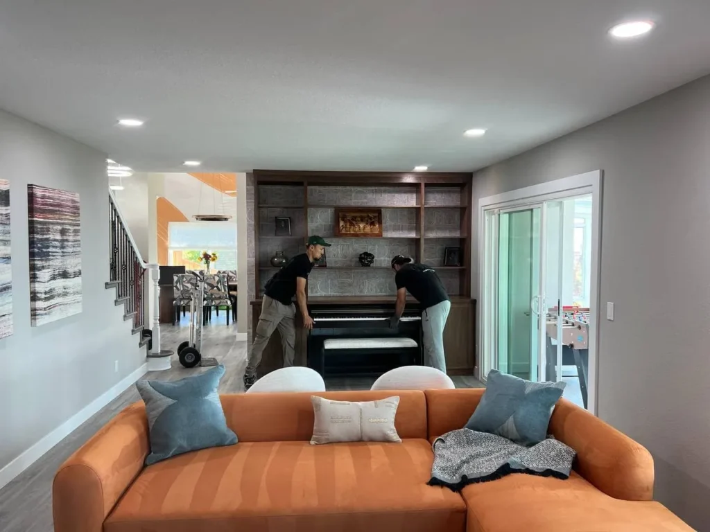 CEO Moving crew preparing to move an upright piano in a Bay Area home